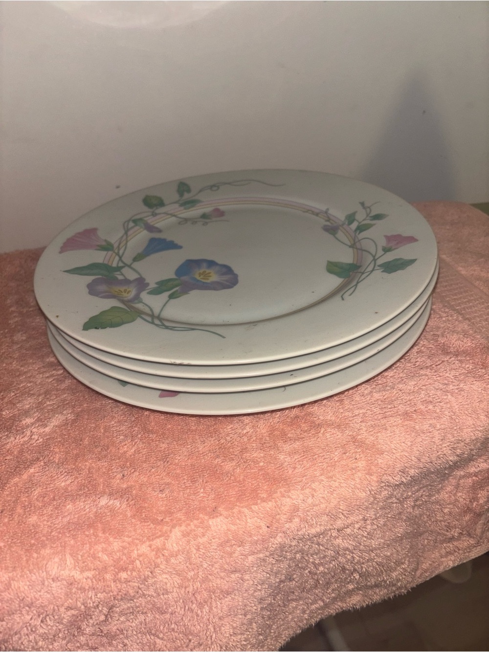 Four vintage floral dinner plates